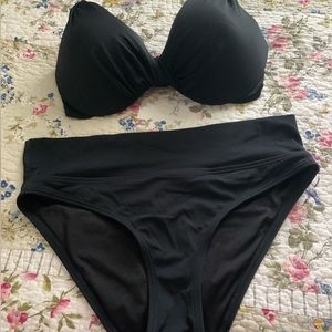 Women’s swimsuit in black.  Size Medium.